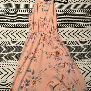 Floral springtime dress. NWOT . Flows and light .